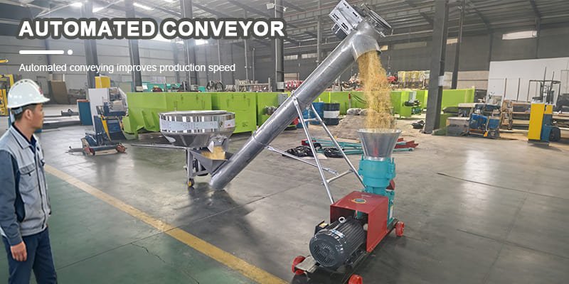A screw auger conveyor lifting mixed feed material into the hopper of a pellet machine.