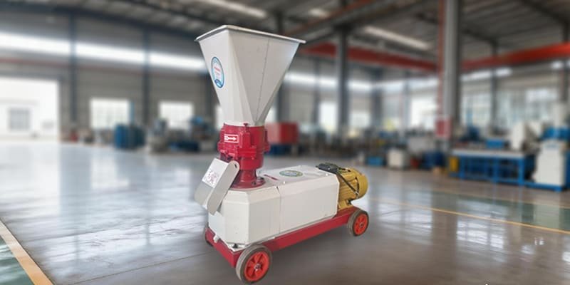 A well-maintained home feed pellet machine in a clean workshop.