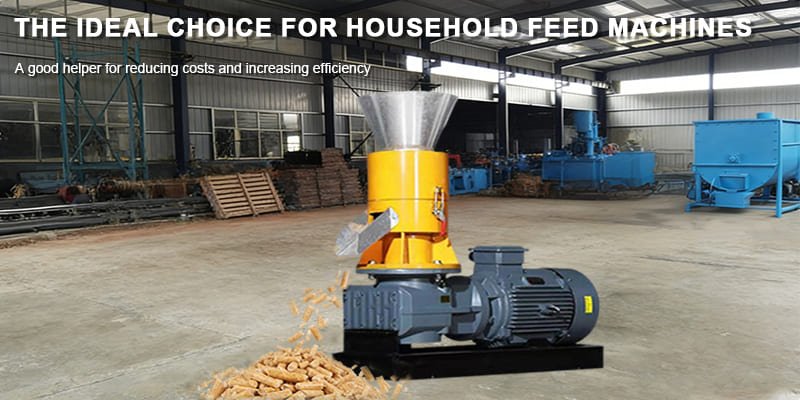 A compact, electric flat die pellet mill in a workshop setting.